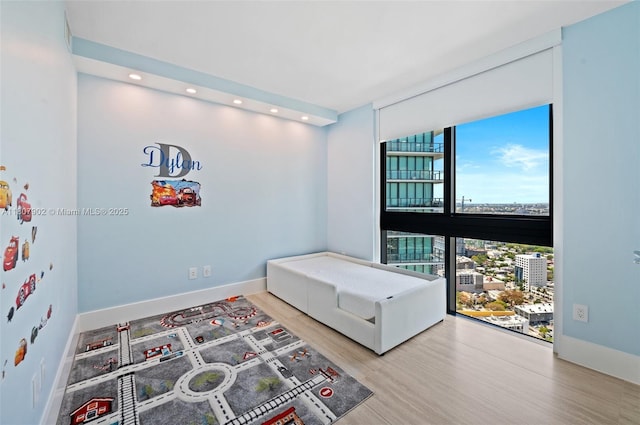 650 NE 32nd St Unit 4101, Miami, FL 33137 - sitting room with wood finished floors, recessed lighting, and baseboards