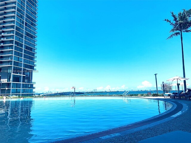 650 NE 32nd St Unit 4101, Miami, FL 33137 - view of pool with a water view