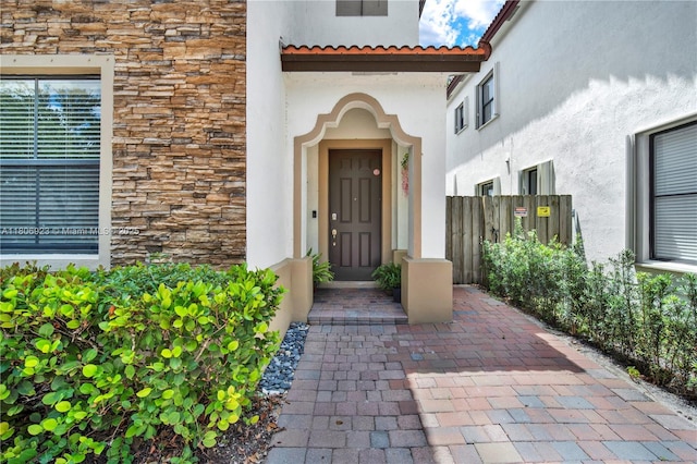 557 SE 37th Pl, Homestead, FL 33033 - entrance to property featuring stone siding and stucco siding