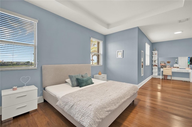 557 SE 37th Pl, Homestead, FL 33033 - bedroom with wood finished floors, baseboards, and a raised ceiling