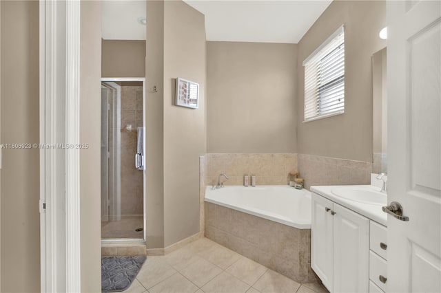 557 SE 37th Pl, Homestead, FL 33033 - full bathroom featuring tile patterned flooring, a bath, a shower stall, and vanity
