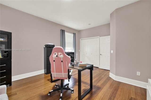 557 SE 37th Pl, Homestead, FL 33033 - office area featuring wood finished floors and baseboards