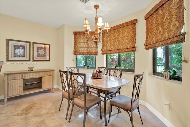 7582 SW 191st St, Cutler Bay, FL 33157 - dining room featuring a chandelier and baseboards