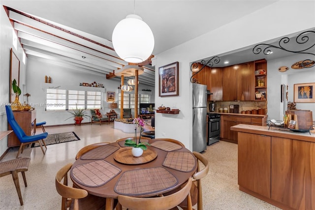 1895 SW 25th St, Miami, FL 33133 - dining space featuring dark aggregate flooring and recessed lighting