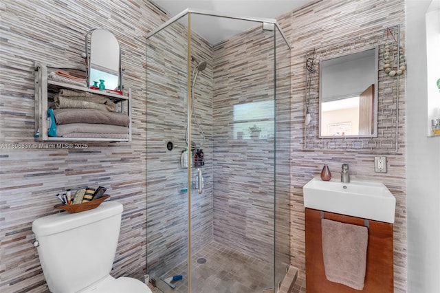 1895 SW 25th St, Miami, FL 33133 - full bathroom with tile walls, toilet, vanity, and a shower stall