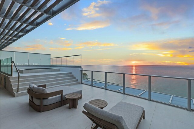 2200 N Ocean Blvd Unit N1102, Fort Lauderdale, FL 33305 - balcony at dusk featuring a water view