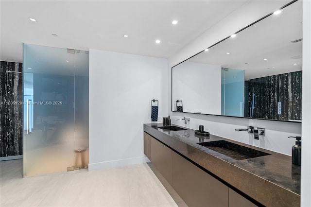 2200 N Ocean Blvd Unit N1102, Fort Lauderdale, FL 33305 - full bath with a walk in shower, double vanity, recessed lighting, and baseboards
