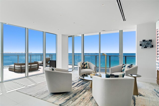 2200 N Ocean Blvd Unit N1102, Fort Lauderdale, FL 33305 - living room featuring floor to ceiling windows and a water view