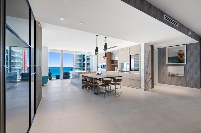 2200 N Ocean Blvd Unit N1102, Fort Lauderdale, FL 33305 - dining area with floor to ceiling windows, plenty of natural light, and a water view