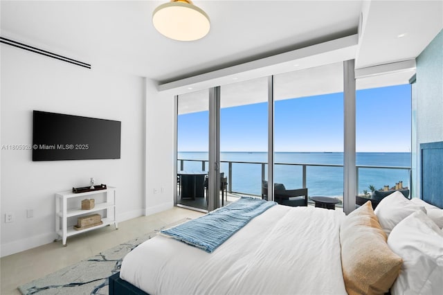 2200 N Ocean Blvd Unit N1102, Fort Lauderdale, FL 33305 - bedroom featuring expansive windows, access to exterior, a water view, and baseboards