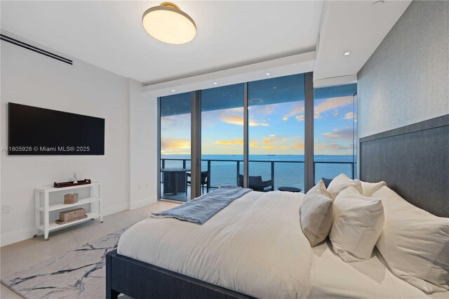 2200 N Ocean Blvd Unit N1102, Fort Lauderdale, FL 33305 - bedroom with baseboards and light carpet