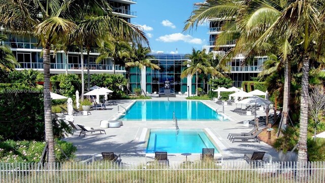 2200 N Ocean Blvd Unit N1102, Fort Lauderdale, FL 33305 - community pool featuring a hot tub and a patio