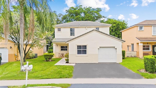 349 NW 207th Ave, Pembroke Pines, FL 33029 - traditional-style home with stucco siding, asphalt driveway, a front yard, an attached garage, and a tiled roof