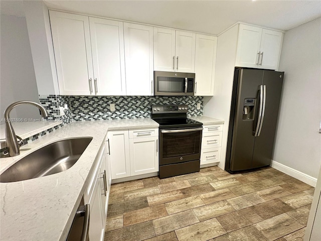 20866 NW 3rd Ln, Pembroke Pines, FL 33029 - kitchen with stainless steel microwave, electric range, fridge with ice dispenser, and decorative backsplash