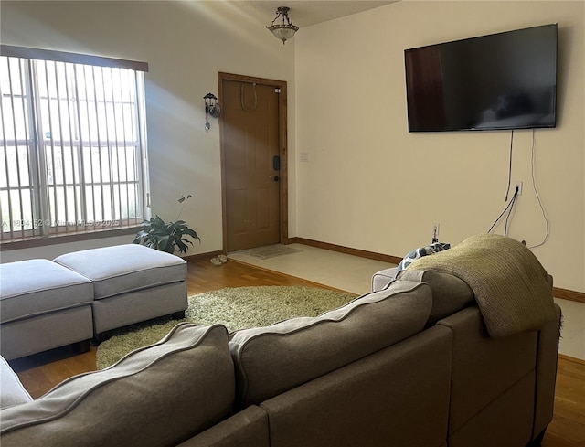 9955 NW 56th Pl, Coral Springs, FL 33076 - living area featuring baseboards and wood finished floors