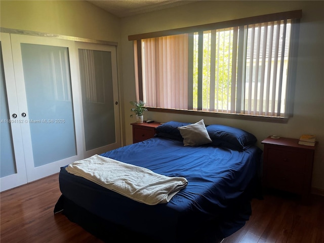 9955 NW 56th Pl, Coral Springs, FL 33076 - bedroom with a closet and wood finished floors