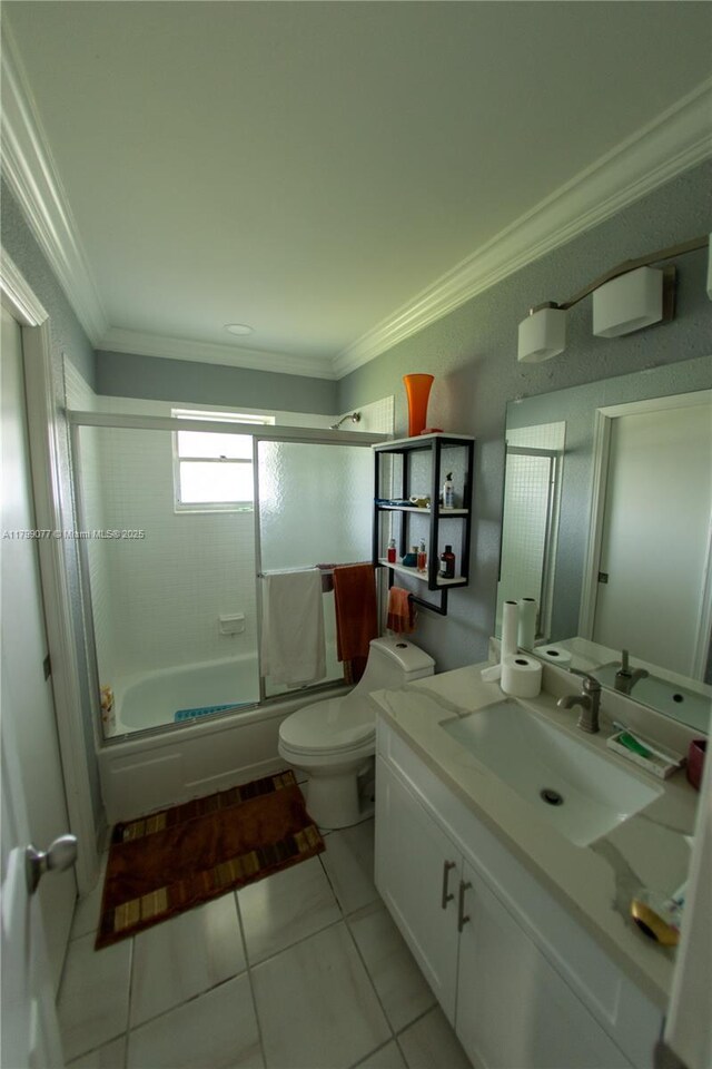 1175 NW 90th Way, Plantation, FL 33322 - bathroom with vanity, toilet, combined bath / shower with glass door, ornamental molding, and tile patterned floors