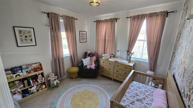 10846 SW 240th Ln, Homestead, FL 33032 - bedroom featuring light tile patterned floors