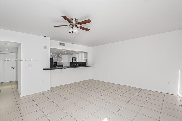 555 NE 15th St Unit 603, Miami, FL 33132 - unfurnished living room with ceiling fan and light tile patterned floors