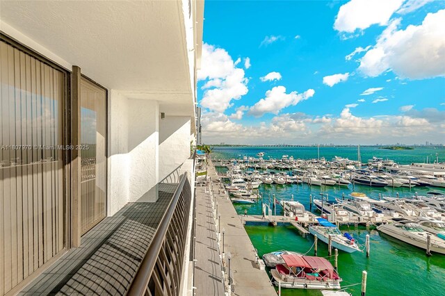 555 NE 15th St Unit 603, Miami, FL 33132 - balcony with view of marina, a water view, and a boat dock