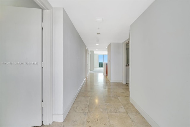 14951 Royal Oaks Ln Unit 1406, North Miami, FL 33181 - hallway featuring baseboards