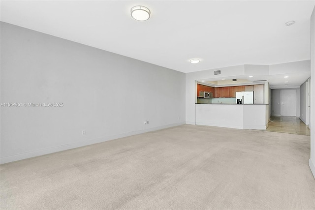 14951 Royal Oaks Ln Unit 1406, North Miami, FL 33181 - unfurnished living room with light carpet, baseboards, and recessed lighting