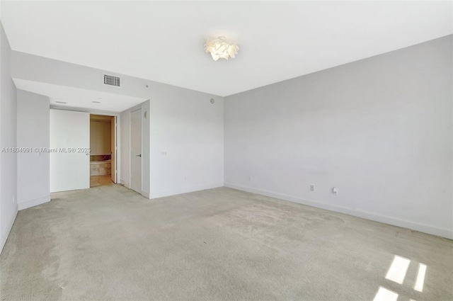 14951 Royal Oaks Ln Unit 1406, North Miami, FL 33181 - unfurnished room featuring light colored carpet and baseboards