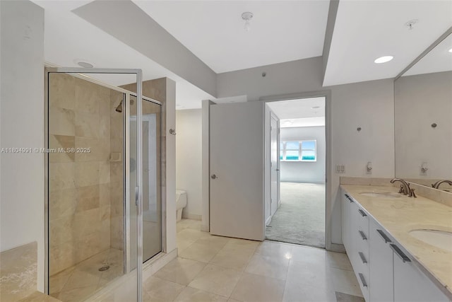 14951 Royal Oaks Ln Unit 1406, North Miami, FL 33181 - full bath featuring double vanity, a stall shower, tile patterned floors, and toilet
