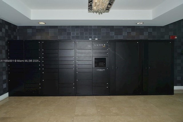 14951 Royal Oaks Ln Unit 1406, North Miami, FL 33181 - view of property's community featuring a package area and recessed lighting
