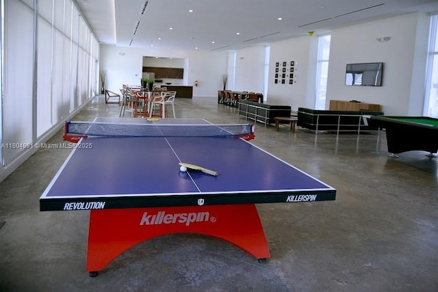14951 Royal Oaks Ln Unit 1406, North Miami, FL 33181 - game room with finished concrete flooring, plenty of natural light, and billiards table
