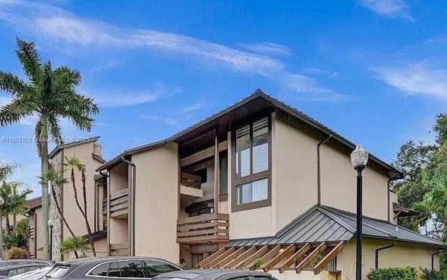 101 SW 96th Ter Unit 204, Plantation, FL 33324 - view of side of home featuring stucco siding
