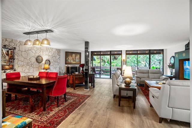 101 SW 96th Ter Unit 204, Plantation, FL 33324 - living room featuring a wall of windows and wood finished floors