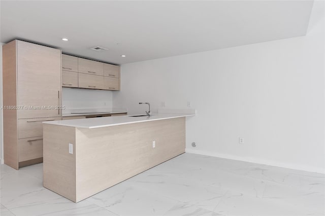 1300 S Miami Ave Unit 3211, Miami, FL 33130 - kitchen with a sink, light marble finish flooring, a peninsula, modern cabinets, and recessed lighting