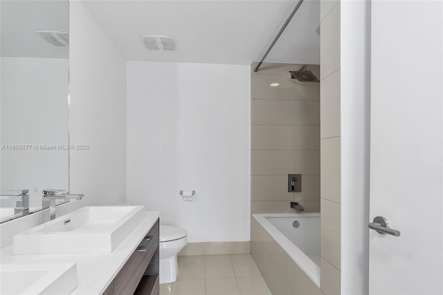 1300 S Miami Ave Unit 3211, Miami, FL 33130 - full bathroom featuring tile patterned floors, double vanity, tiled shower / bath combo, toilet, and baseboards