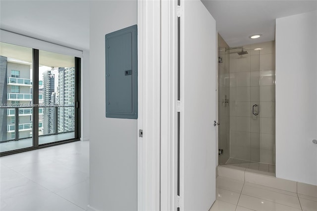 1300 S Miami Ave Unit 3211, Miami, FL 33130 - bathroom featuring electric panel, tile patterned floors, and a stall shower