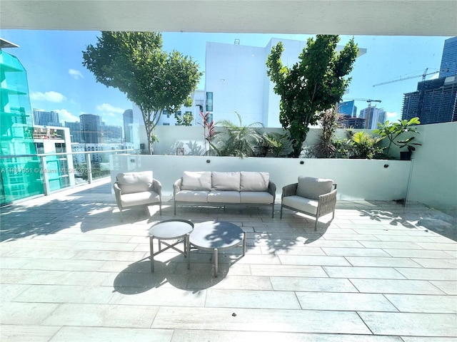 1600 SW 1st Ave Unit 910, Miami, FL 33129 - wooden terrace featuring a skyline view and an outdoor hangout area