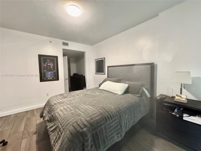 1600 SW 1st Ave Unit 910, Miami, FL 33129 - bedroom featuring wood finished floors and baseboards