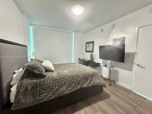 1600 SW 1st Ave Unit 910, Miami, FL 33129 - bedroom with wood finished floors and baseboards