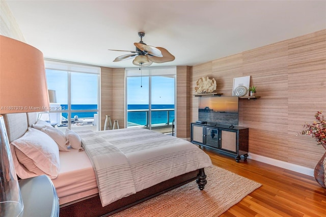 101 S Fort Lauderdale Beach Blvd Unit 1001, Fort Lauderdale, FL 33316 - bedroom featuring wood finished floors, baseboards, and a ceiling fan