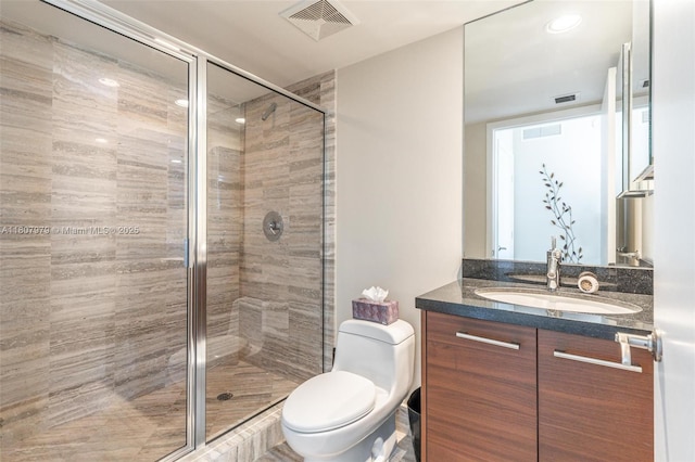 101 S Fort Lauderdale Beach Blvd Unit 1001, Fort Lauderdale, FL 33316 - bathroom with vanity, a shower stall, and toilet