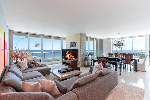 101 S Fort Lauderdale Beach Blvd Unit 1001, Fort Lauderdale, FL 33316 - living area featuring floor to ceiling windows and a chandelier