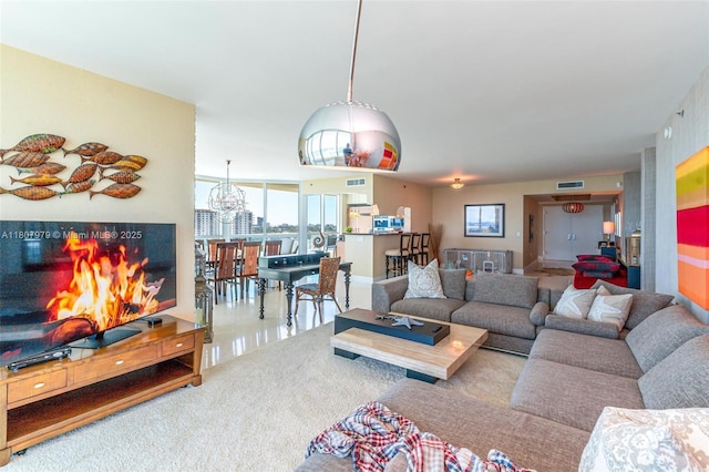101 S Fort Lauderdale Beach Blvd Unit 1001, Fort Lauderdale, FL 33316 - living room with a chandelier