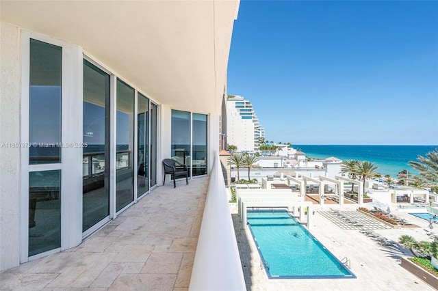101 S Fort Lauderdale Beach Blvd Unit 1001, Fort Lauderdale, FL 33316 - balcony featuring a water view and view of pool area
