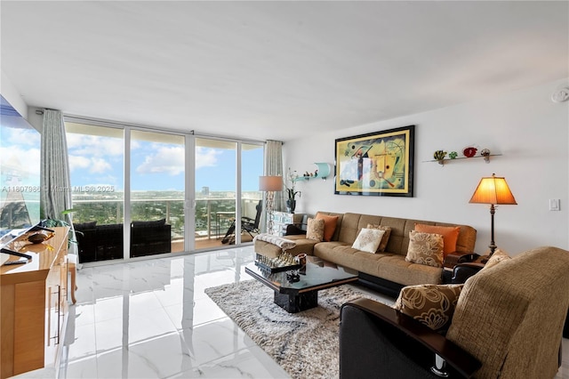 3140 S Ocean Dr Unit 2310, Hallandale Beach, FL 33009 - living room with a wall of windows and marble finish flooring