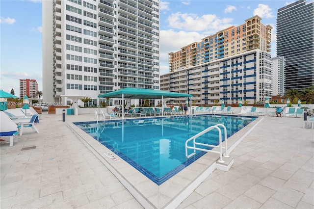 3140 S Ocean Dr Unit 2310, Hallandale Beach, FL 33009 - community pool featuring a city view and a patio