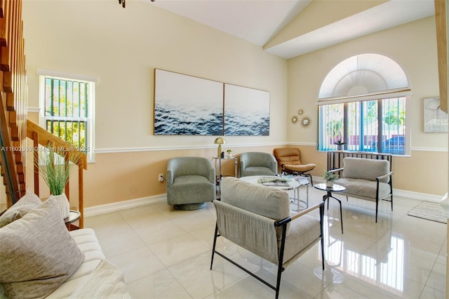 7891 SW 9th Ter, Miami, FL 33144 - living area with baseboards, tile patterned flooring, and high vaulted ceiling