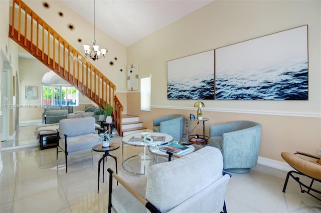 7891 SW 9th Ter, Miami, FL 33144 - living area featuring stairs, tile patterned floors, baseboards, and a chandelier