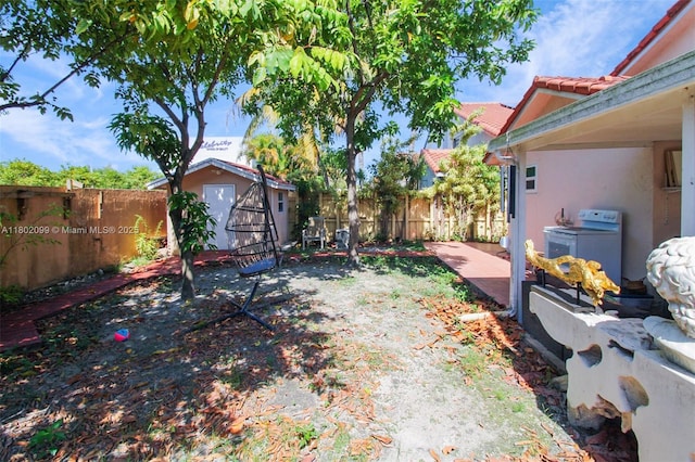 7891 SW 9th Ter, Miami, FL 33144 - fenced backyard featuring a patio