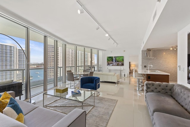 495 Brickell Ave Unit 2304, Miami, FL 33131 - living area with track lighting and light tile patterned floors