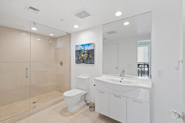 495 Brickell Ave Unit 2304, Miami, FL 33131 - full bathroom with toilet, vanity, a stall shower, tile patterned flooring, and recessed lighting